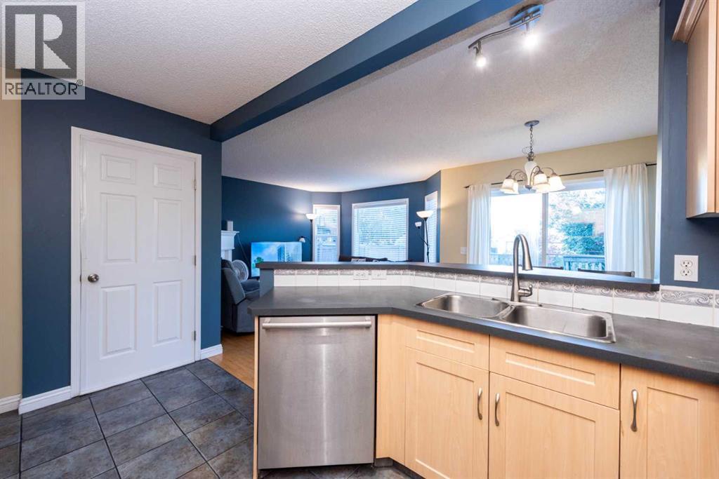 49 Rocky Ridge Heath Nw, Calgary, Alberta  T3G 4Z7 - Photo 6 - A2259925