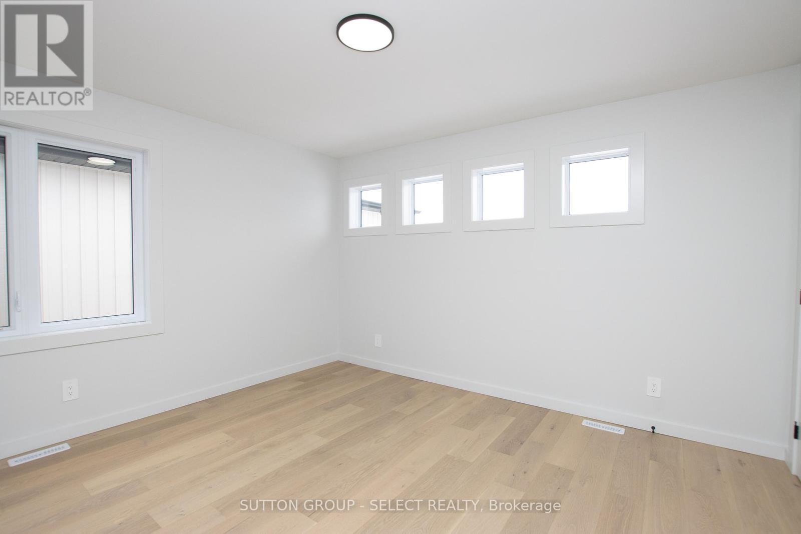 115 Optimist Drive, Southwold, Ontario  N5P 3T2 - Photo 32 - X12293107