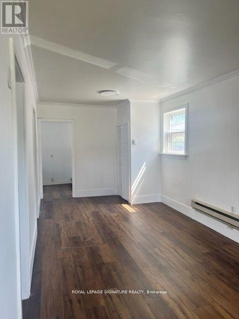 1045 Strathy Avenue, Mississauga, Ontario  L5E 2J6 - Photo 3 - W12431052