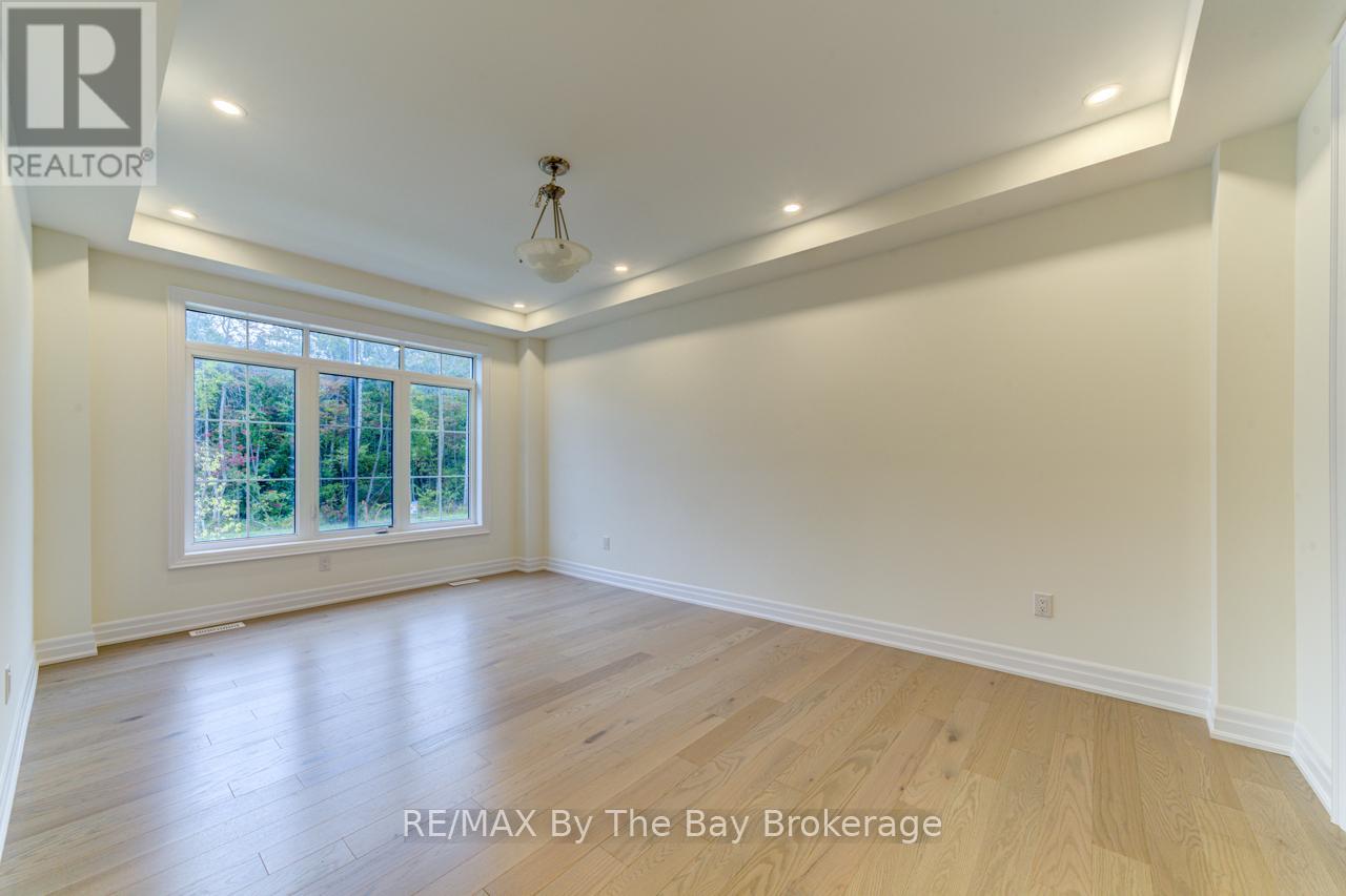 186 Mapleside Drive, Wasaga Beach, Ontario  L9Z 0L4 - Photo 4 - S12431071