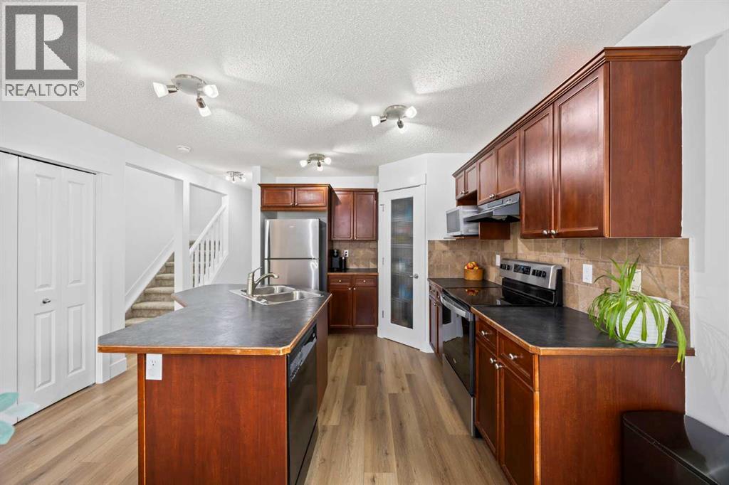 93 Crystal Shores Heights, Okotoks, Alberta  T1S 2K9 - Photo 11 - A2253422
