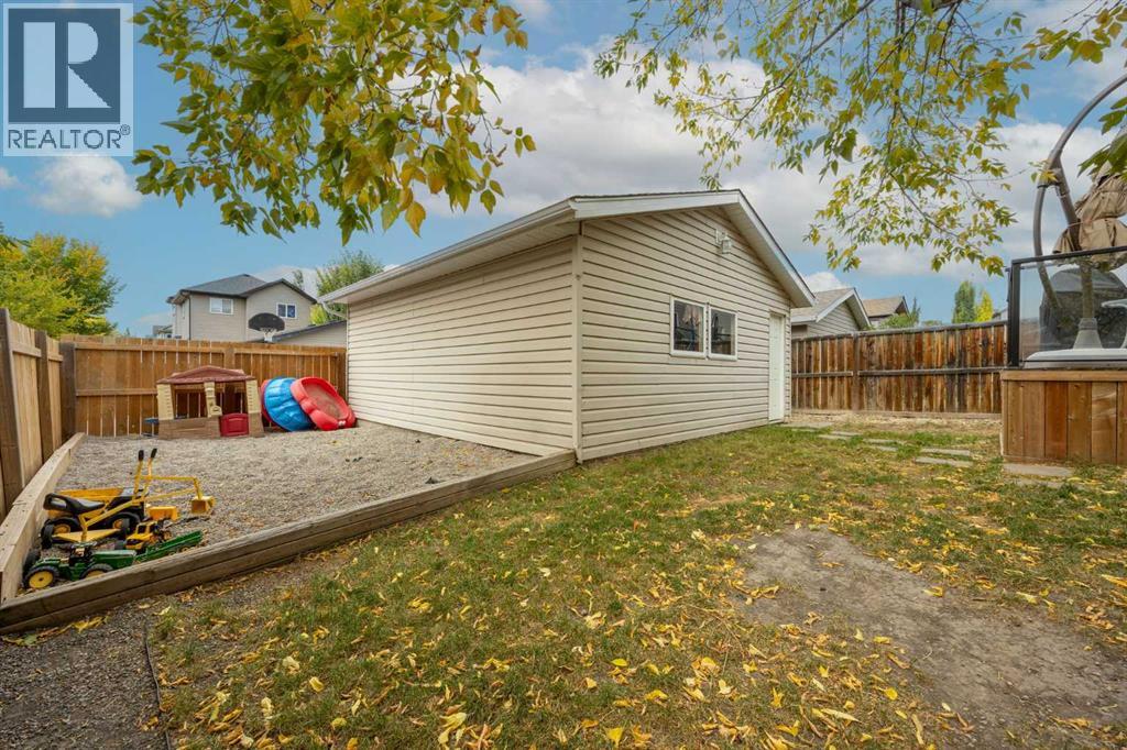 93 Crystal Shores Heights, Okotoks, Alberta  T1S 2K9 - Photo 32 - A2253422