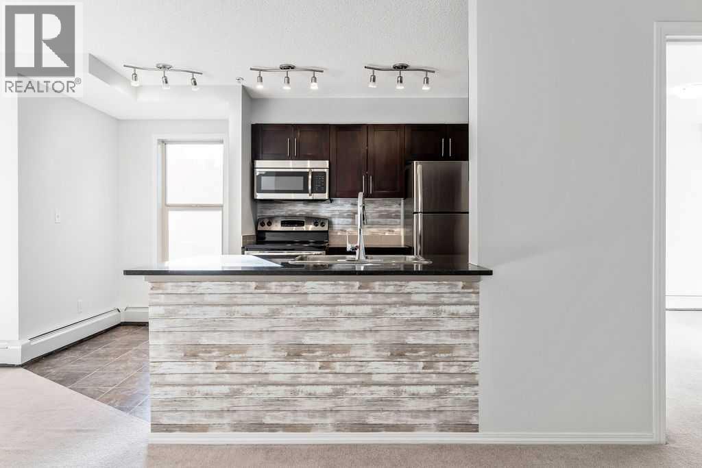 9113, 403 Mackenzie Way Sw, Airdrie, Alberta  t4b 3v7 - Photo 4 - A2259958