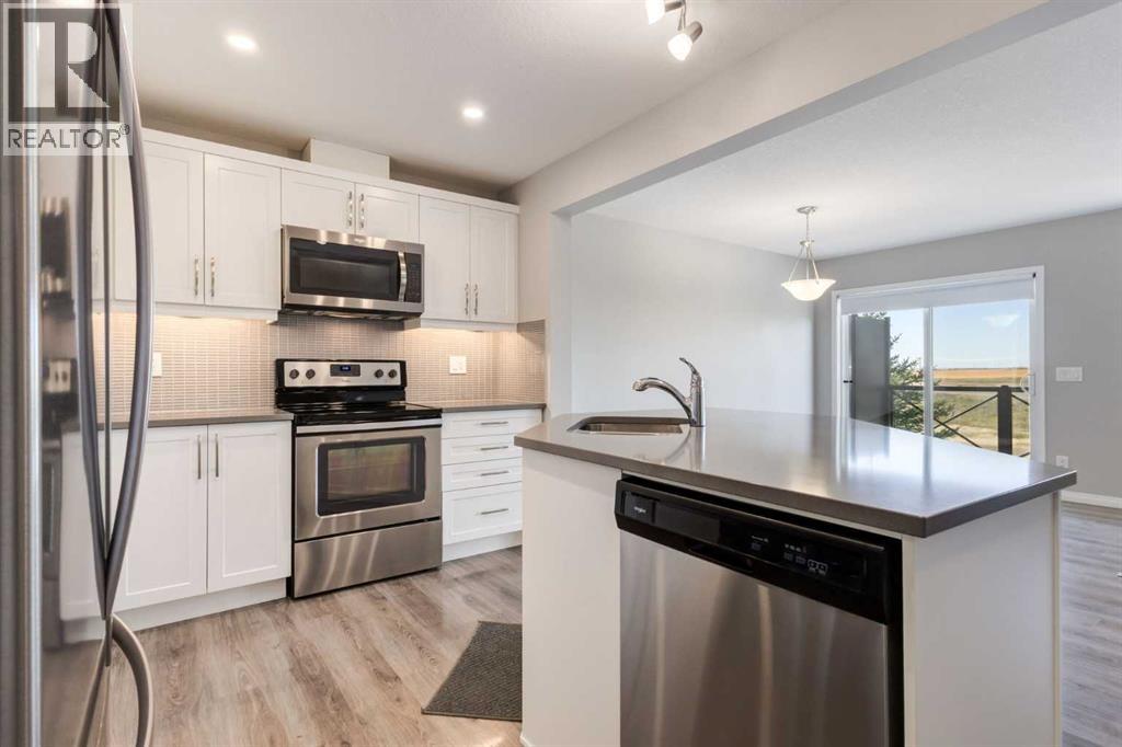 157 Hillcrest Square Sw, Airdrie, Alberta  T4B 4J1 - Photo 7 - A2259294