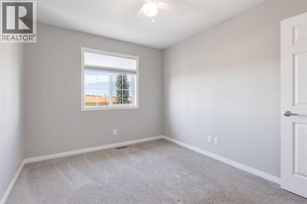 157 Hillcrest Square Sw, Airdrie, Alberta  T4B 4J1 - Photo 24 - A2259294