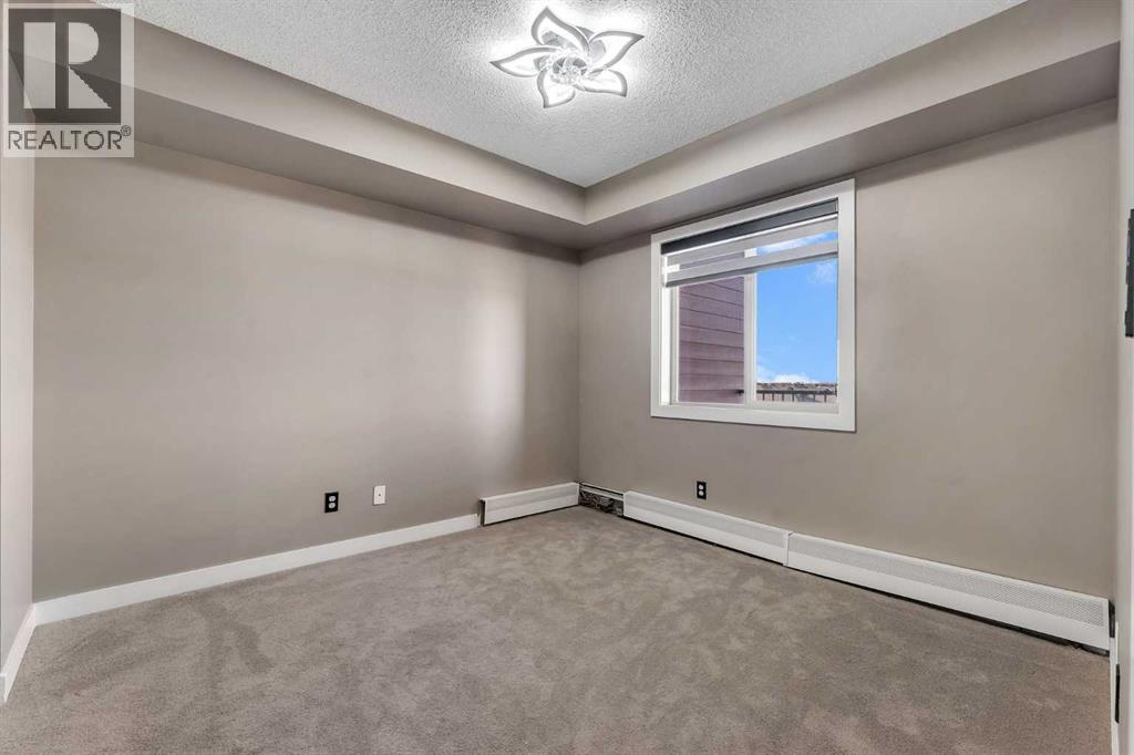415, 5 Saddlestone Way Ne, Calgary, Alberta  T3J 0S2 - Photo 11 - A2260422