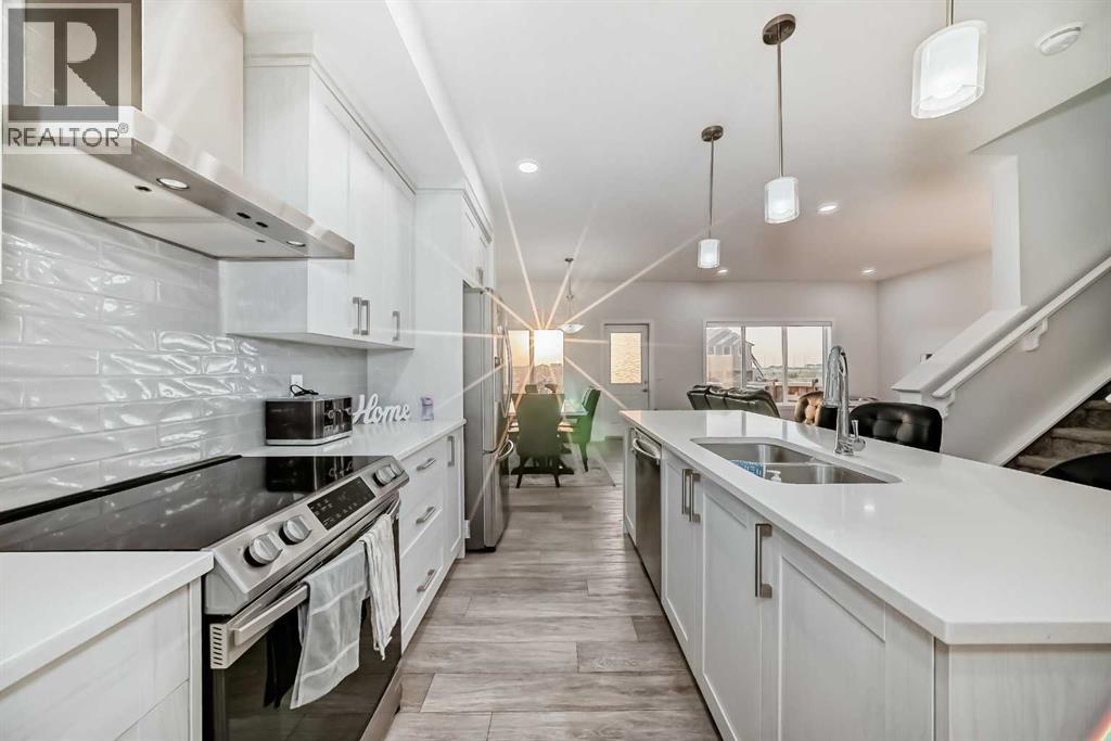 165 Savanna Passage Ne, Calgary, Alberta  T3J 2J7 - Photo 4 - A2257794