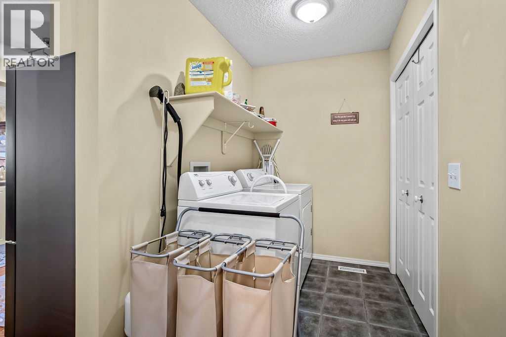 85 Bridleridge Road Sw, Calgary, Alberta  T2Y 4E1 - Photo 11 - A2257420