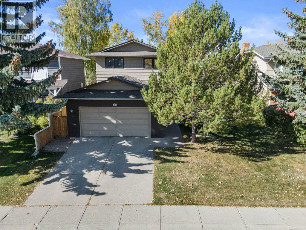 47 Woodmont Way Sw, Calgary, Alberta  T2W 4L7 - Photo 1 - A2260483