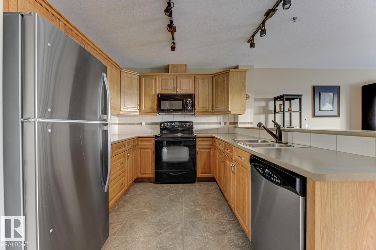 #310 530 Hooke Rd Nw, Edmonton, Alberta  T5A 5J5 - Photo 5 - E4459913