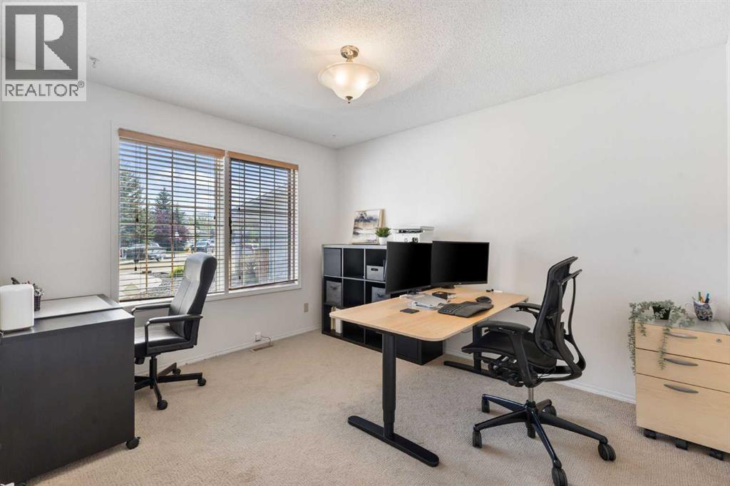 2 Riverside Place, Cochrane, Alberta  T4C 1J6 - Photo 29 - A2255683