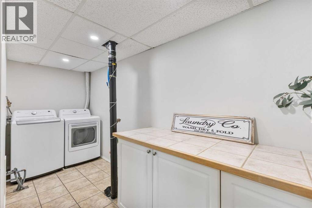 2 Riverside Place, Cochrane, Alberta  T4C 1J6 - Photo 40 - A2255683