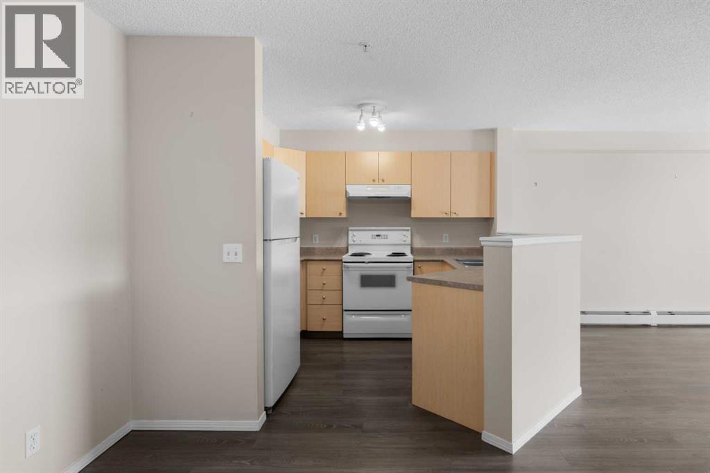 1303, 12 Cimarron Common, Okotoks, Alberta  T1S 2G1 - Photo 5 - A2260126