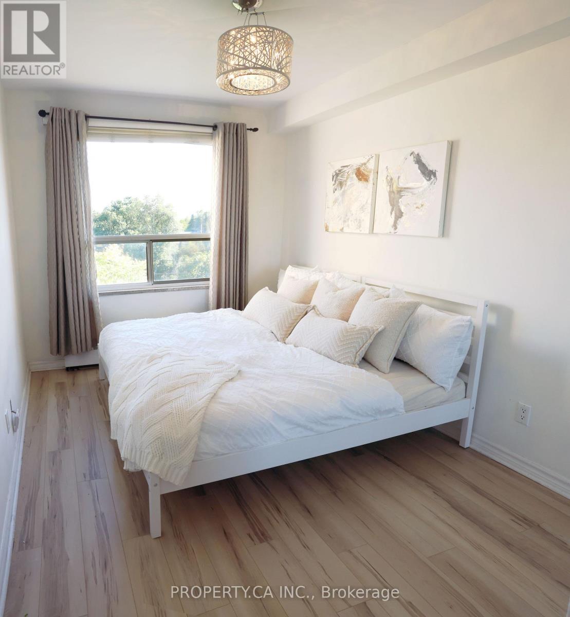 303 - 60 Gulliver Road, Toronto, Ontario  M6M 2M6 - Photo 22 - W12431429