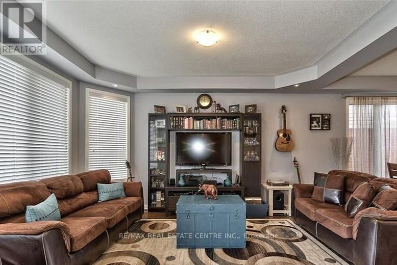 881 Challinor Terrace, Milton, Ontario  L9T 7V6 - Photo 3 - W12431493