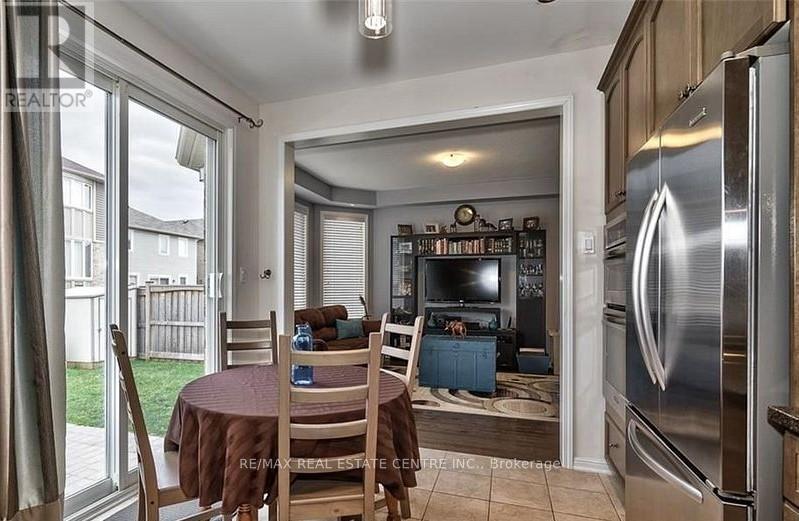 881 Challinor Terrace, Milton, Ontario  L9T 7V6 - Photo 6 - W12431493