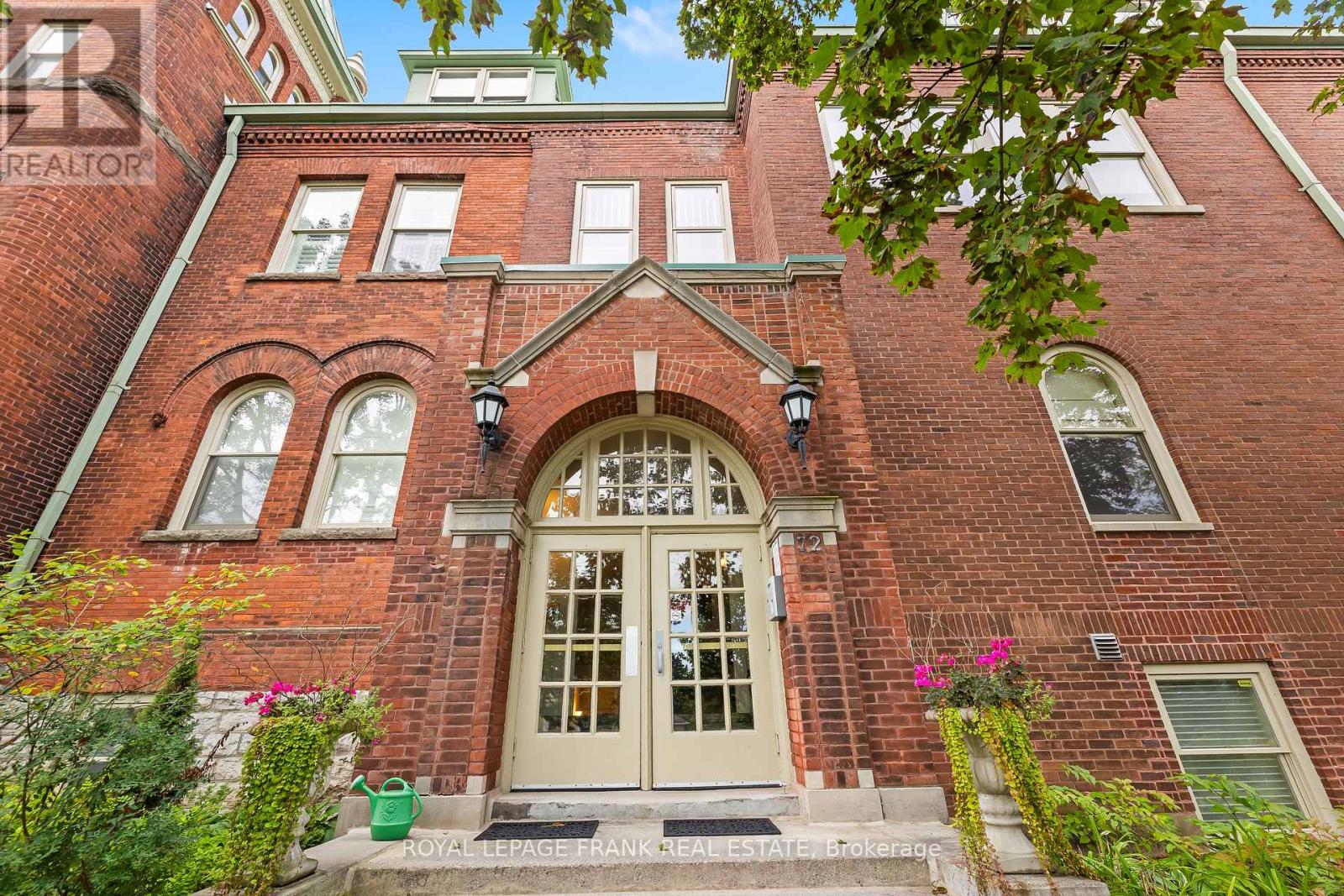 Welcome To This Former Schoolhouse Transformed To A Stunning Condo.  Approx. 1700 Sq. Feet Of Main Floor Living Space Filled With Charm And Character, Soaring 11 Ft. Ceilings,  Large Windows & Gleaming Hardwood Floors. Spacious Kitchen Offers S/S Appliances, Centre Island & Garburator. Generous Primary Bedroom Offers Plenty Of Space To Set Up A Reading Nook, 4 Pce. Washroom And Walk In Closet. 2nd Bedroom Could Be Used As Home Office. The Convenience Of Main Flr. Laundry Rm Provides Extra Storage Space.  This Is A Must See Unit Close To Beautiful Downtown Port Hope Restaurants, Shops And Trinity College. New A/C And Furnace 2022.  New HRV November 2025.HWT Owned. Building Amenities Include Exercise Room, Library/Meeting Room. (id:48254)