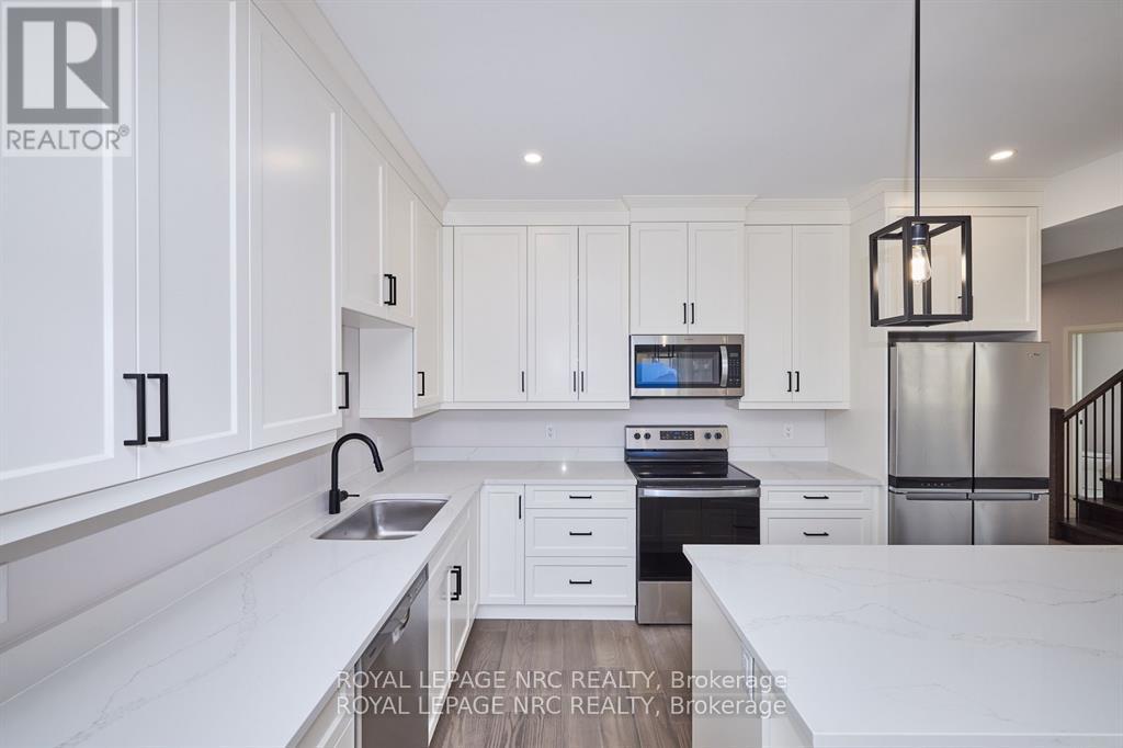 149 Hodgkins Avenue, Thorold (Allanburg/thorold South), Ontario  L2V 0M6 - Photo 8 - X12431741