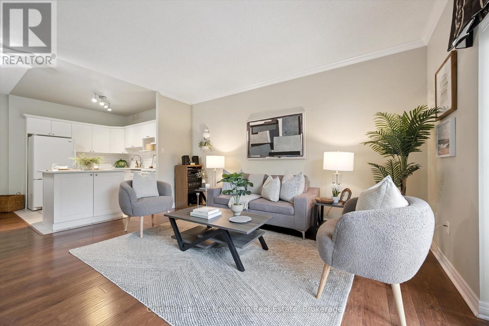 206 - 60 Wyndham Street S, Guelph, Ontario  N1E 7H7 - Photo 1 - X12431817