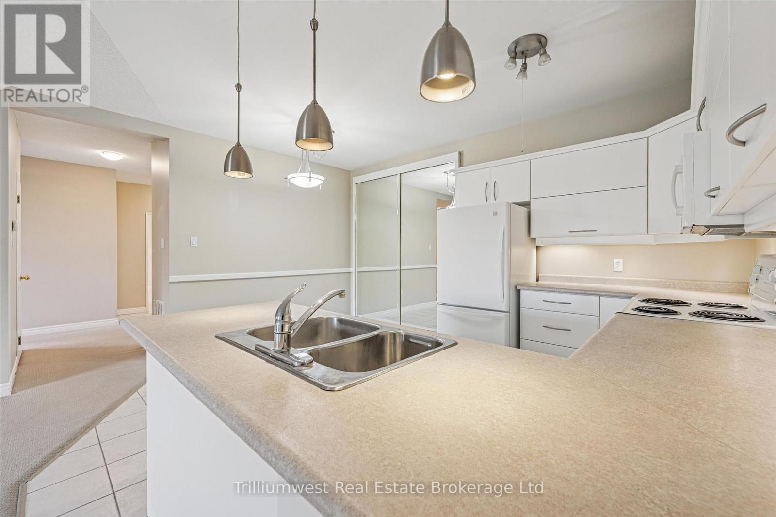 304 - 60 Wyndham Street S, Guelph, Ontario  N1E 7H7 - Photo 20 - X12432048