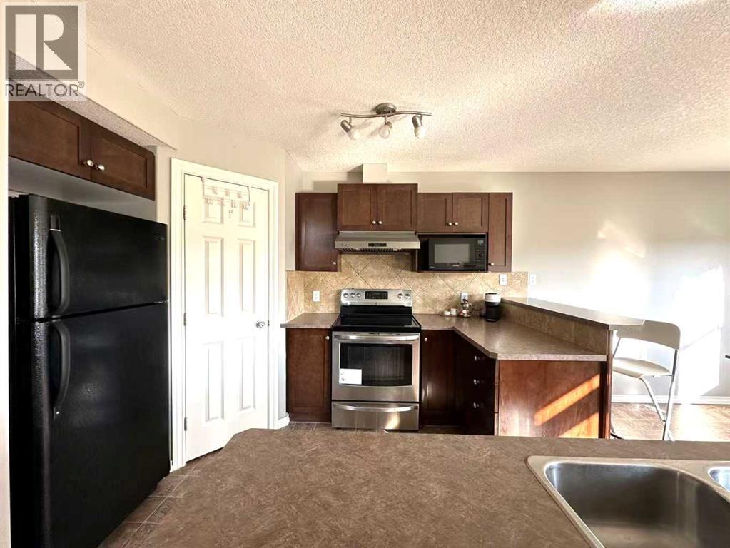 200 Royal Crest View Nw, Calgary, Alberta  T3G 5W3 - Photo 7 - A2254155