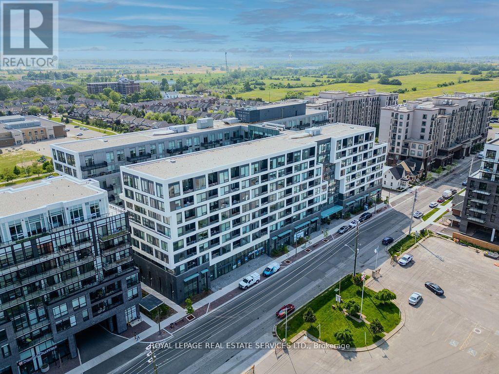 438 - 2450 Old Bronte Road, Oakville, Ontario  L6M 5P6 - Photo 1 - W12431936