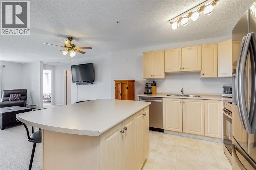 7308, 304 Mackenzie Way Sw, Airdrie, Alberta  T4B 3H7 - Photo 4 - A2260044