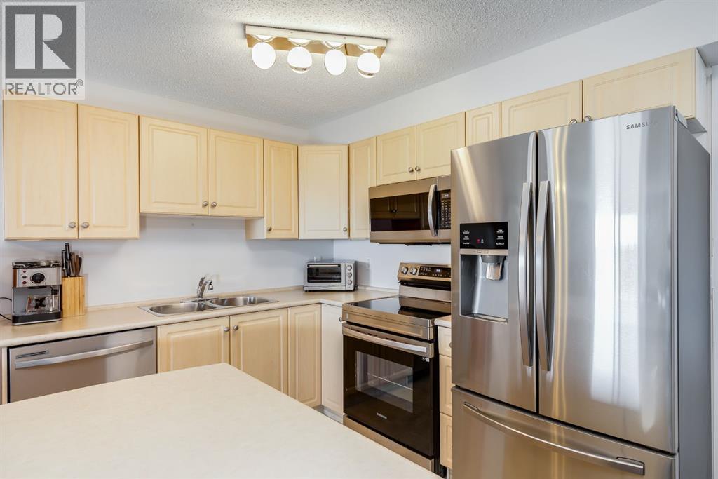 7308, 304 Mackenzie Way Sw, Airdrie, Alberta  T4B 3H7 - Photo 5 - A2260044