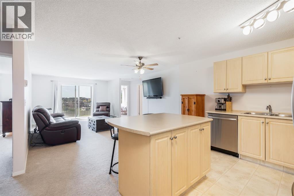7308, 304 Mackenzie Way Sw, Airdrie, Alberta  T4B 3H7 - Photo 3 - A2260044