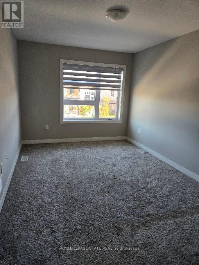 940 Robert Ferrie Drive, Kitchener, Ontario  N2R 0P9 - Photo 17 - X12431839