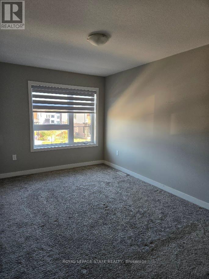 940 Robert Ferrie Drive, Kitchener, Ontario  N2R 0P9 - Photo 9 - X12431839