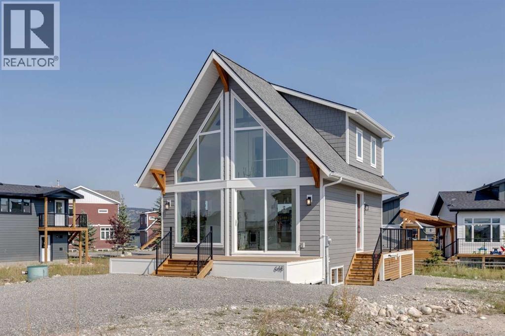 648 Cottageclub Bend, Rural Rocky View County, Alberta  T4C 1B1 - Photo 2 - A2256184