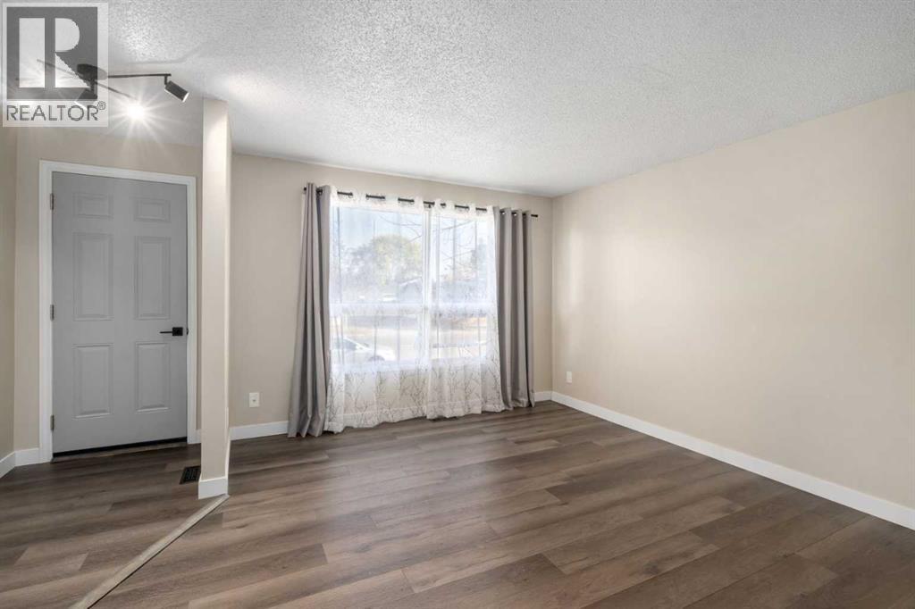 71 Riverbend Drive Se, Calgary, Alberta  T2C 3S5 - Photo 3 - A2259991