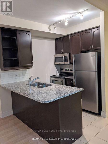 801 - 100 John Street, Brampton, Ontario  L6W 0A8 - Photo 6 - W12432069