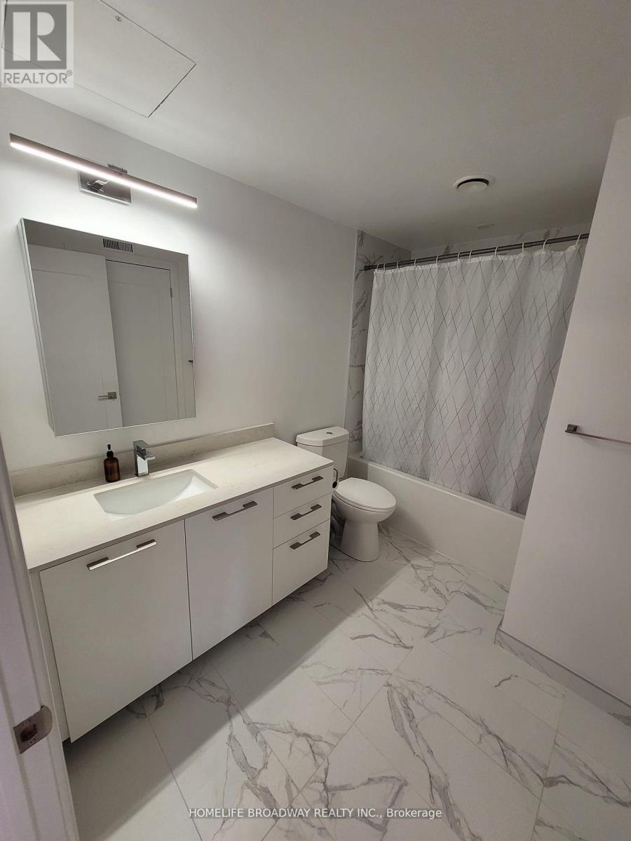 201 - 18 Water Walk Drive, Markham, Ontario  L3R 6L5 - Photo 5 - N12428361