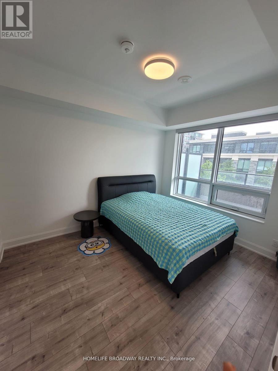 201 - 18 Water Walk Drive, Markham, Ontario  L3R 6L5 - Photo 4 - N12428361