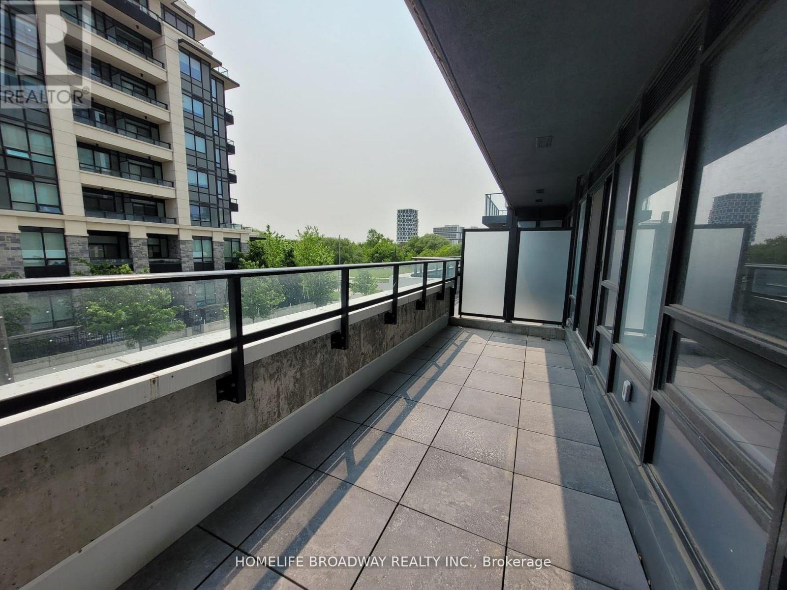 201 - 18 Water Walk Drive, Markham, Ontario  L3R 6L5 - Photo 6 - N12428361