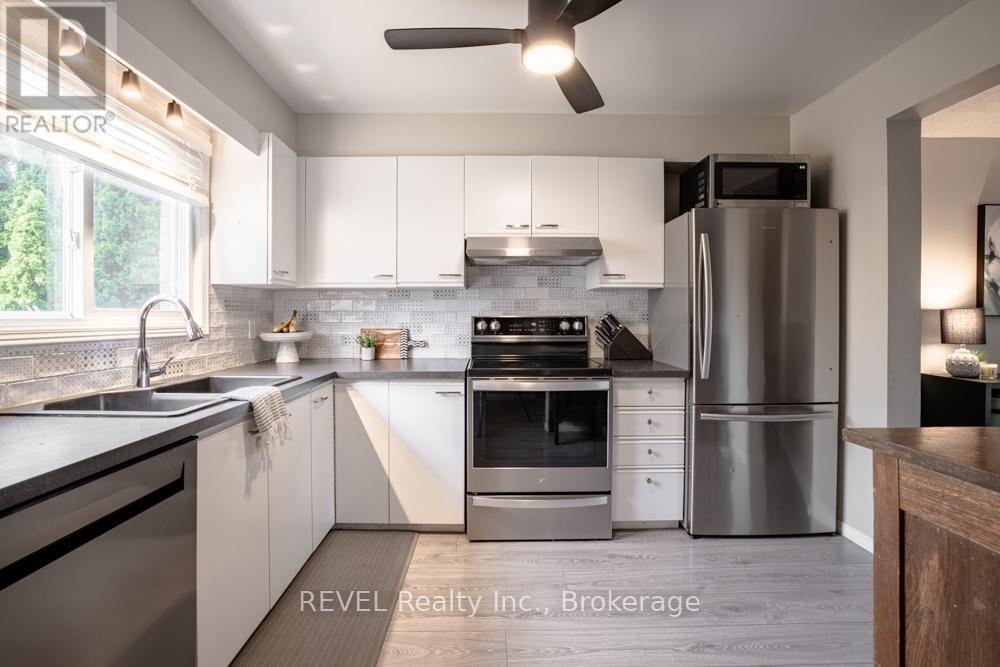14 - 65 Dorchester Boulevard, St. Catharines, Ontario  L2M 7T3 - Photo 2 - X12432222