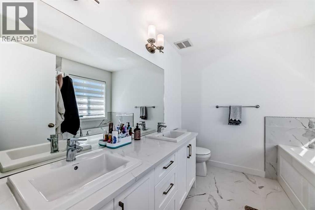 53 Spring Creek Common Sw, Calgary, Alberta  T3H 6E2 - Photo 27 - A2253606