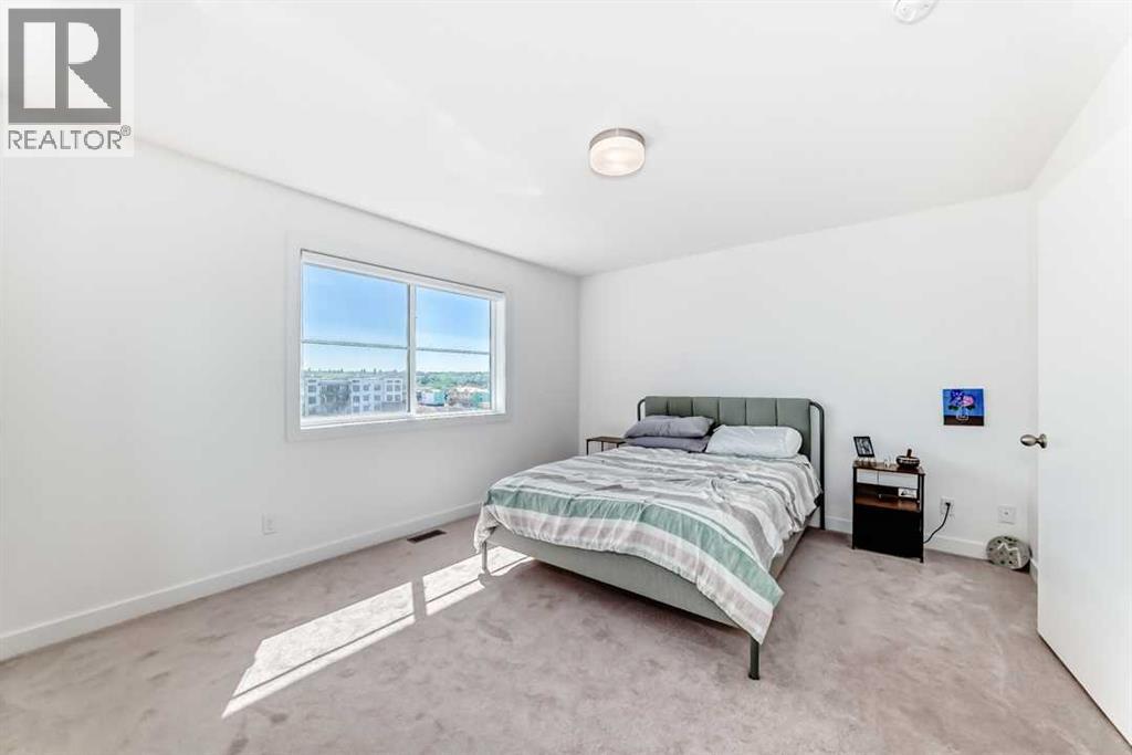 53 Spring Creek Common Sw, Calgary, Alberta  T3H 6E2 - Photo 24 - A2253606