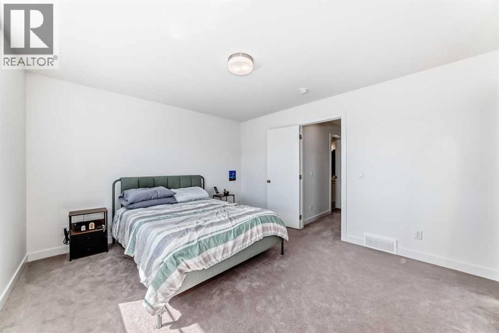 53 Spring Creek Common Sw, Calgary, Alberta  T3H 6E2 - Photo 25 - A2253606