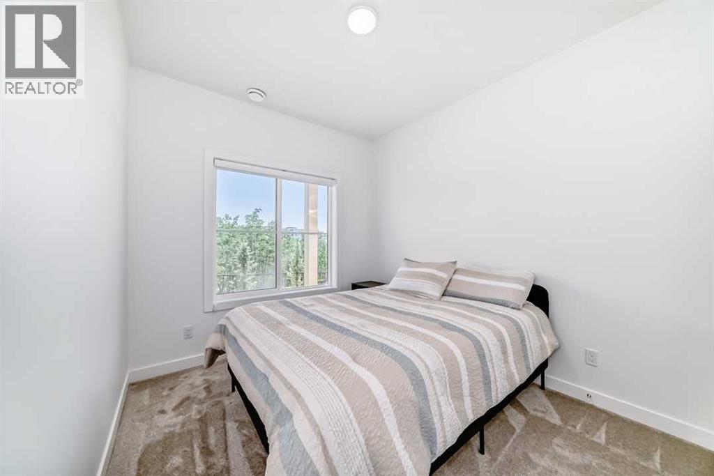 53 Spring Creek Common Sw, Calgary, Alberta  T3H 6E2 - Photo 39 - A2253606