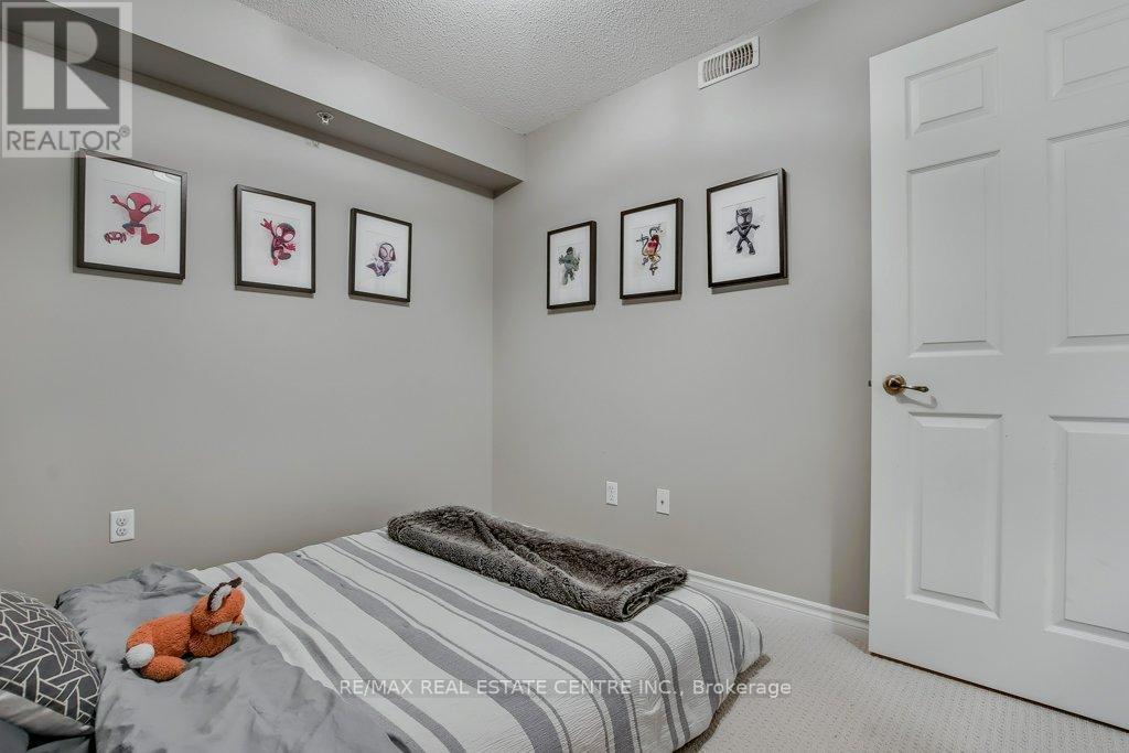 407 - 1479 Maple Avenue, Milton, Ontario  L9T 0B5 - Photo 18 - W12432089