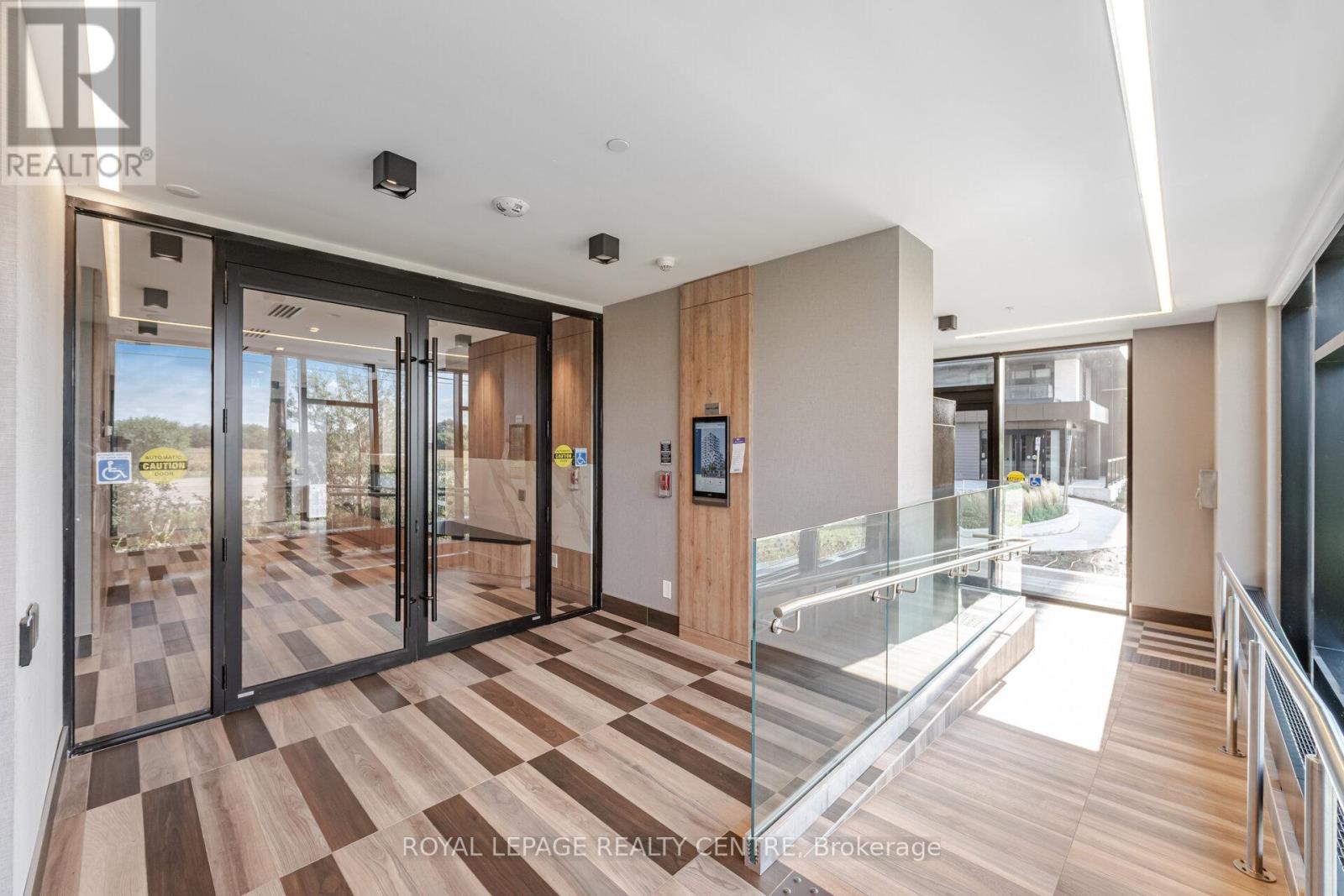 810 - 345 Wheat Boom Drive, Oakville, Ontario  L6H 7X4 - Photo 4 - W12432240