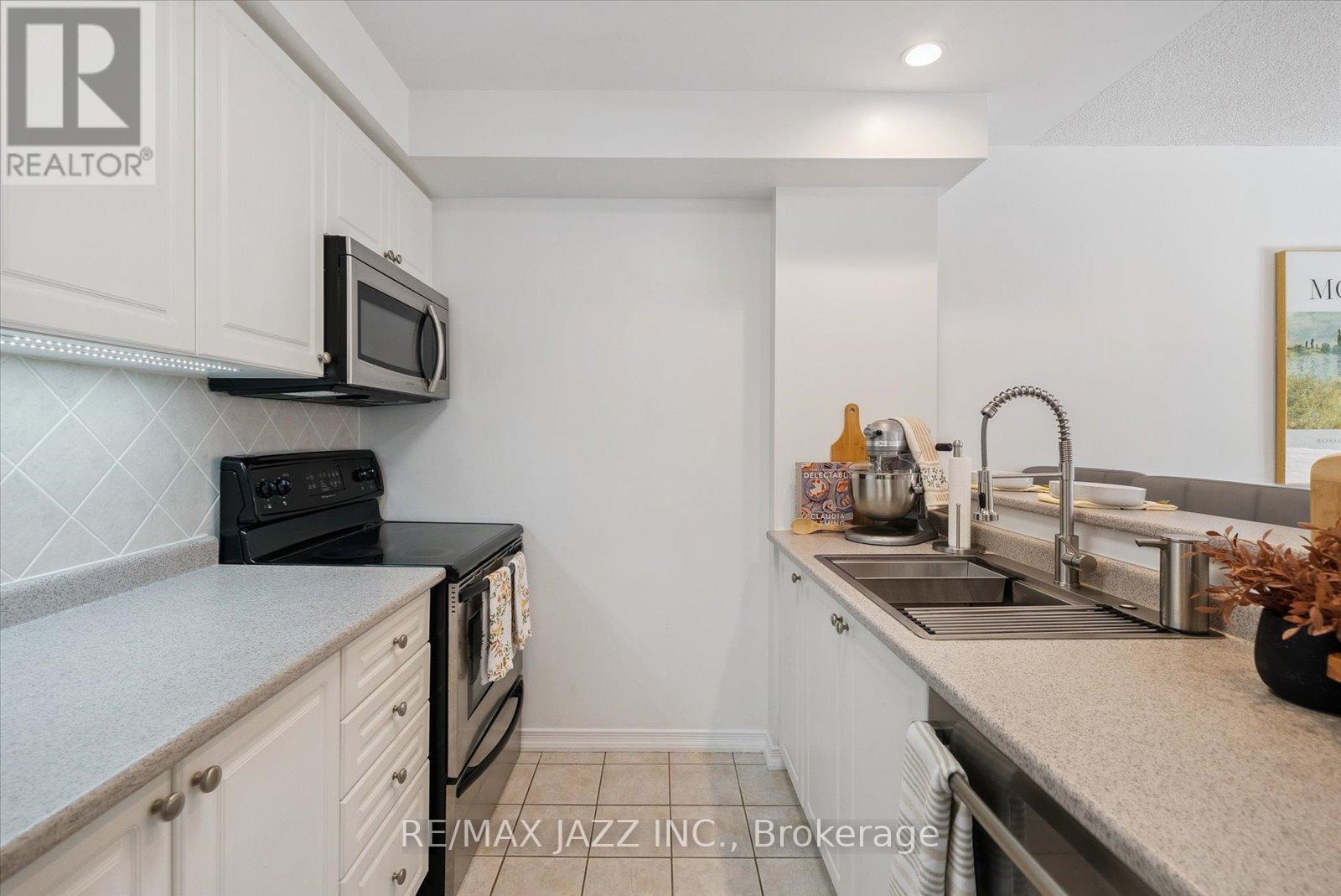 205 - 120 Aspen Springs Drive, Clarington, Ontario  L1C 0G7 - Photo 13 - E12432438