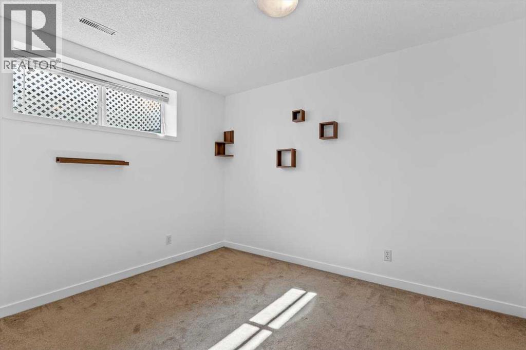 57 Everwillow Boulevard Sw, Calgary, Alberta  T2Y 4G4 - Photo 34 - A2255389