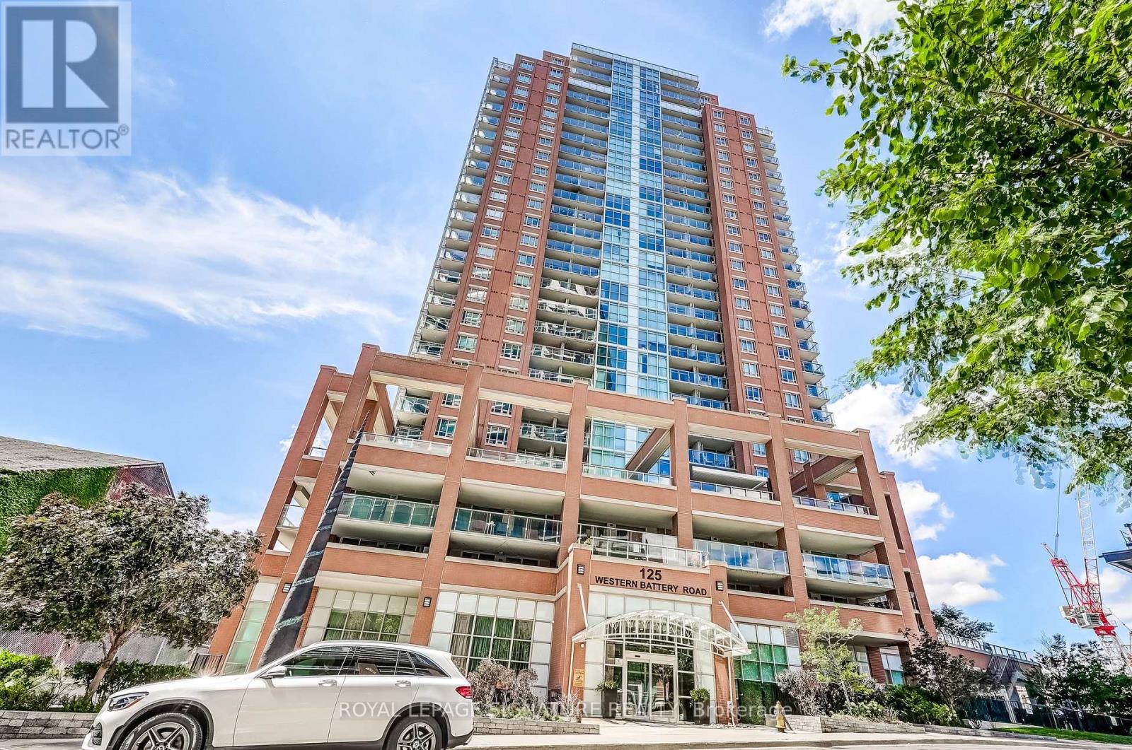 A true gem in the heart of Liberty Village. From the moment you step inside of this rarely offered, newly renovated 2 bedroom, 2 bathroom corner unit you will be captivated by the soaring 16 foot ceilings. Sun drenched and full of natural light with floor to ceiling windows at every turn. The sleek kitchen comes equipped with modern cabinetry, high end quartz counters and quartz backsplash, stainless steel appliances, black hardware and opens up to the massive living and dining area. The spacious primary bedroom has a large walk-in closet and ensuite bathroom that was just upgraded with high end finishes. Now lets talk about the 622 sq ft wrap around balcony which is one of the many showstoppers in this unit and has gorgeous views of everything Liberty Village has to offer. You will never be short of space when you are entertaining or hosting parties. Includes approved plans, permit and drawings for a 2nd floor, 3rd bedroom or family room addition. Don't miss your chance to see this one-of-a-kind loft style unit in one of the best neighbourhood's in Toronto. (id:48254)
