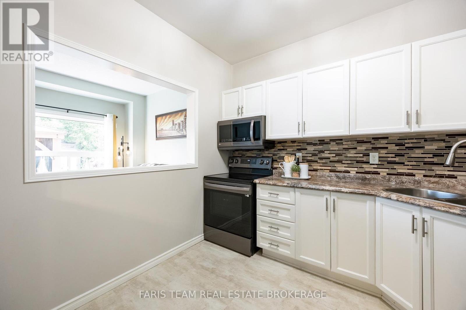 80 Bruce Crescent, Barrie (Bayshore), Ontario  L4N 8T8 - Photo 6 - S12426509