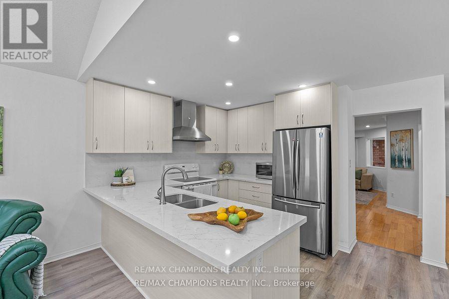 30 Larkspur Road, Brampton, Ontario  L6R 2T6 - Photo 3 - W12432474