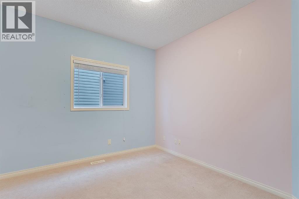 596 Cougar Ridge Drive Sw, Calgary, Alberta  T3H 5A4 - Photo 17 - A2216232